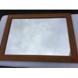 A plain modern Laura Ashley oak framed mirror - dowel jointed. (43.5in x 31.5in)