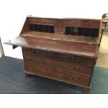 A George III mahogany bureau, the boxwood strung fallfront revealing a fitted interior with small
