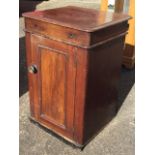 A nineteenth century mahogany washstand cabinet, the moulded top with dummy drawer revealing an