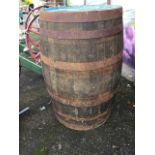 A 3ft oak barrel, the staves bound by six metal strap bands. (35.5in)