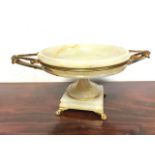 A regency marble tazza, the shallow moulded bowl mounted with outreach ormolu entwined handles