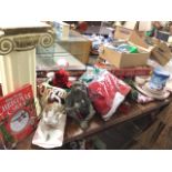 A quantity of Christmas gear including ornaments, cloths, candles, a stoneware serving set, tree