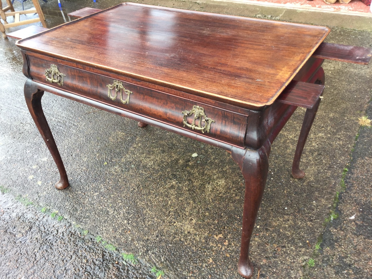 A large Georgian mahogany silver table, the cut-corner tray top above a cushion moulded frieze - Image 2 of 3