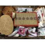 A box of miscellaneous sewing materials including buttons, cottons, beads, sewing baskets,