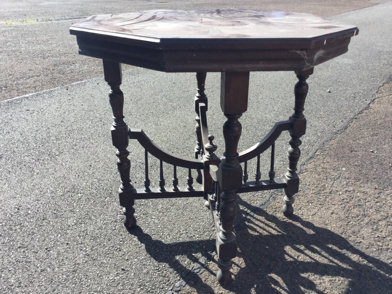 A late Victorian octagonal window table, the moulded top on baluster turned legs joined by curved - Image 2 of 3