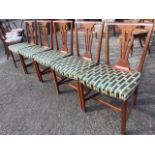 A set of six nineteenth century Chippendale style mahogany dining chairs, the backs with plain rails