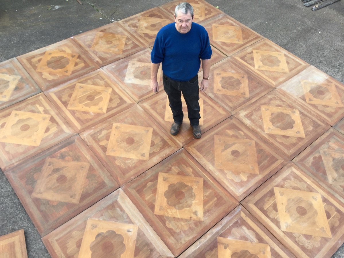 A set of 25 Victorian square parquetry floor panels by The London Parquetry Works, Camberwell,