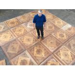 A set of 25 Victorian square parquetry floor panels by The London Parquetry Works, Camberwell,