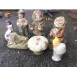 Various composition stone garden ornaments - gnomes, scarecrow, toadstool, mermaid, lion, etc. (7)