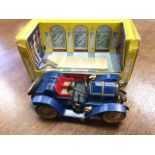 A boxed Schuco tinplate vintage car, the working Mercer complete with instructions and key. (9in