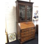 A married Georgian mahogany bureau bookcase, with moulded cornice above astragal glazed doors