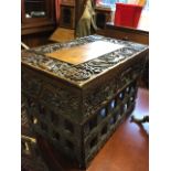 A carved nineteenth century Chinese hardwood table, the rectangular box with folding square