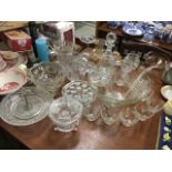Miscellaneous glass including a cut glass decanter & stopper, fruit bowls, jugs, a vine embossed