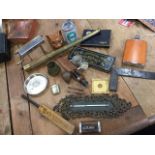 Miscellaneous collectors items including tins, a sheath knife, a flask, a novelty can lighter,
