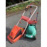 A Flymo Sprintmaster XE400 twin electric garden mower; and a Qualcast Easi-trak 320 mower. (2)