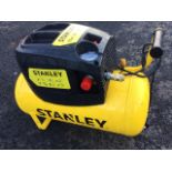 A Stanley electric compressor with 24 litre tank.