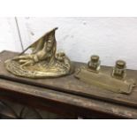 A French brass inkwell deskstand commemorating Waterloo, cast with soldier lying with flag on
