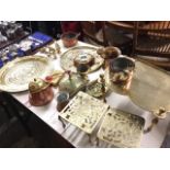 Miscellaneous brass & copper including eastern trays, a mortar & pestle, a set of five graduated