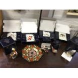 A collection of eight boxed Royal Crown Derby animal figurines, some with certificates - a crested