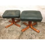 A pair of contemporary rectangular leather upholstered stools, with angled panel stitched tops on