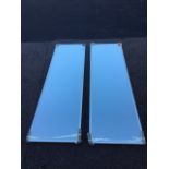 A pair of rectangular mirror door panels in moulded white frames. (24in x 81in) (2)