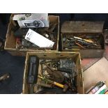 A metal toolbox and two boxes of tools - hammers, drills, chisels, screwdrivers, a pump, spanners, a