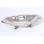 Early 20th century Dutch white metal cake dish of faceted form with turnover rim and hand-beaten