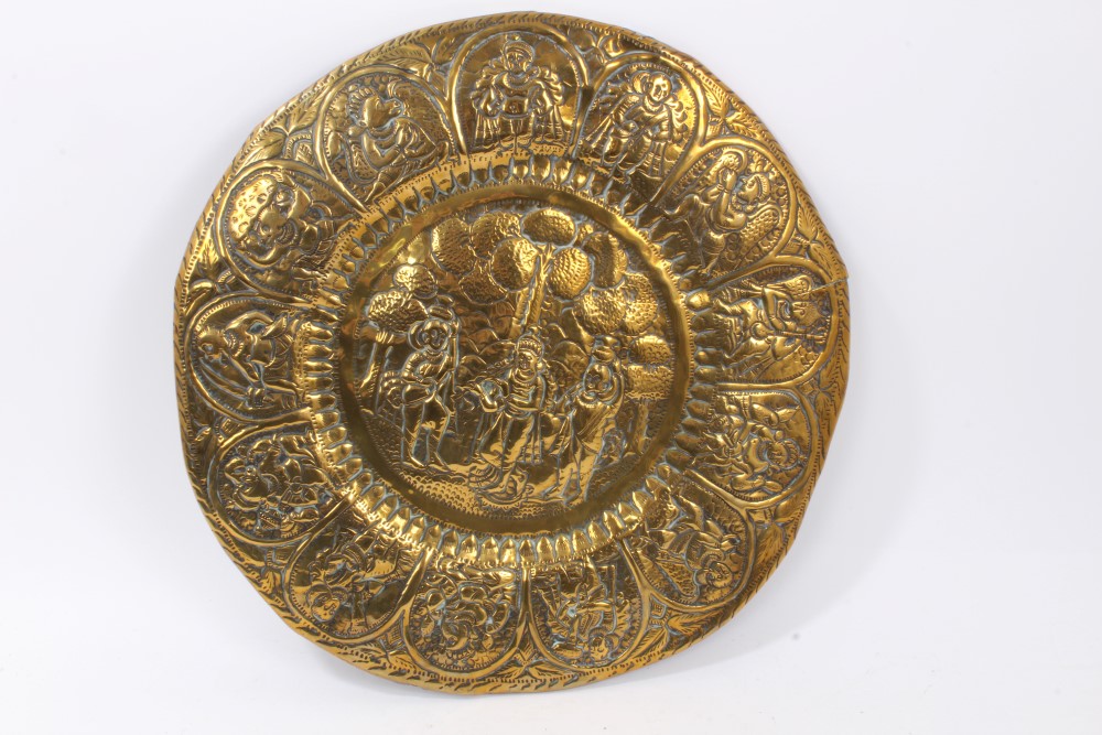 Five 19th Century Indian circular brass temple plates decorated in relief with Gods and figures, - Image 6 of 6