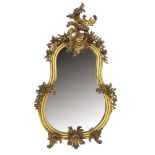 19th century rococo revival gilt gesso mirror of kidney form, with foliate C-scroll ornament,