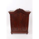 Late 19th century carved mahogany miniature armoire,