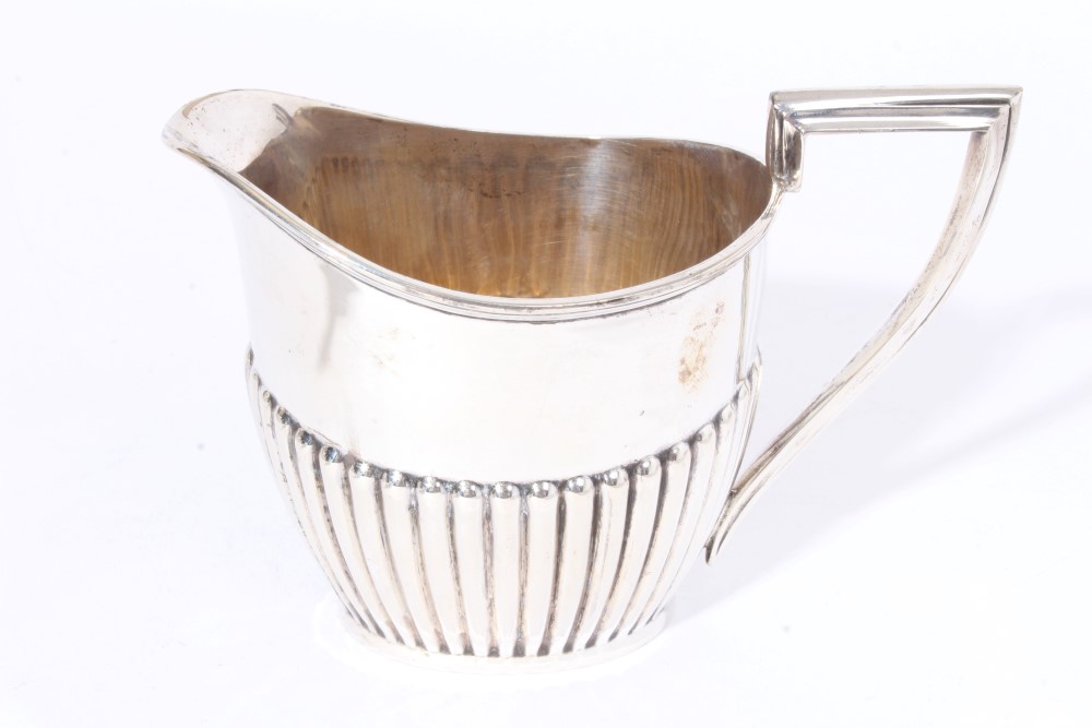 George V silver teapot of half fluted form with angular ebony handle and hinged domed and fluted - Image 7 of 13