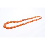 Old amber bead necklace with a string of graduated butterscotch amber beads measuring approximately