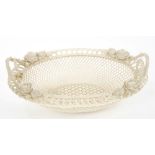 Fine Edwardian Belleek white porcelain basket with rose stalk handles and rose,