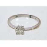 Diamond single stone ring with a brilliant cut diamond estimated to weigh approximately 0.