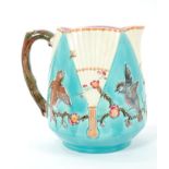 Victorian Wedgwood majolica jug with moulded branch handle and Aesthetic Movement fan,