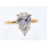 Diamond single stone ring, the pear cut diamond weighing approximately 3.