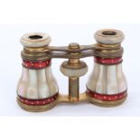Pair late 19th Century opera glasses with Mother of Pearl and red and gilt enamel decoration in