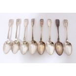 Set of eight George IV silver fiddle pattern dessert spoons with engraved armorial crests (London