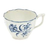 Rare 18th century Worcester fluted tea cup with painted gillyflower pattern decoration,