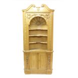 Impressive George II-style carved pine standing corner cupboard with broken arch pediment and