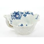 18th century Worcester blue and white leaf-moulded butterboat with floral decoration and stalk