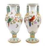 Pair Victorian two-handled vases, finely polychrome painted with parrots, insects and grapevines,