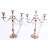 Pair of 19th century two-branch candelabra with three sconces with gadrooned borders and reeded