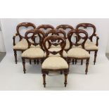 Set of eight Victorian-style mahogany dining chairs each with oval carved back and cream