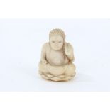 Fine 19th Century miniature Oriental carved ivory figure of Buddha in seated repose on lotus base,