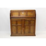 Good quality Late 19th century mahogany military style cabinet the panelled sloping fall with Hobbs
