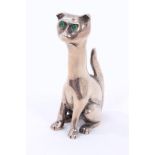 White metal cat sculpture green glass inset eyes, apparently unmarked,