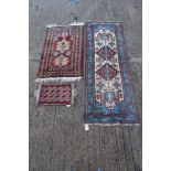 Tribal style runner with conjoined geometric ornament on cream ground and multiple meander borders,
