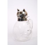 Victorian claret jug with silver mount in the form of a cat's head with glass eyes (registration