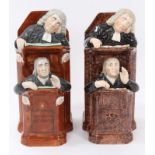 A pearlware 'Vicar and Moses' group, the two figures in a tortoiseshell glazed pulpit, 9½" high,